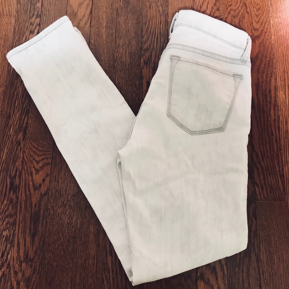 J Brand “Rail” Destroyed Mid Rise Skinny Jeans